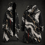 Front and back views of a hooded longline cloak or coat with a black, white, and gray marble pattern accented by gold veining and red paint drips, shown on a dark studio background.