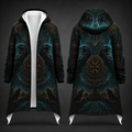 Front and back views of a hooded longline coat with an all-over dark fantasy print featuring raven faces, teal and black stormy scenery, and ornate gold circular motifs, shown on a dark gray background.