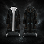 A long hooded coat shown from the front and back on a dark smoky studio background. The coat is predominantly black with an intricate dark blue and bronze gothic filigree pattern, featuring a white inner lining visible at the open front and a white curved hem detail.