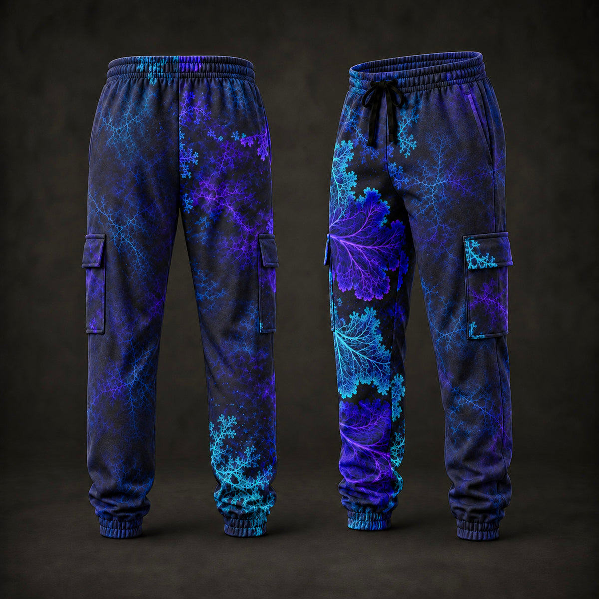A pair of jogger-style cargo pants shown from the back and side, featuring a dark charcoal base with a vivid neon fractal leaf pattern in purple and cyan blue. The pants have an elastic waistband with a drawstring, side cargo pockets, and ribbed ankle cuffs.