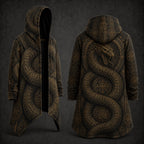 A hooded longline coat shown from the front and back on a dark studio background. The garment has an all-over intricate serpent and circular geometric pattern in warm gold and brown tones on a black base.
